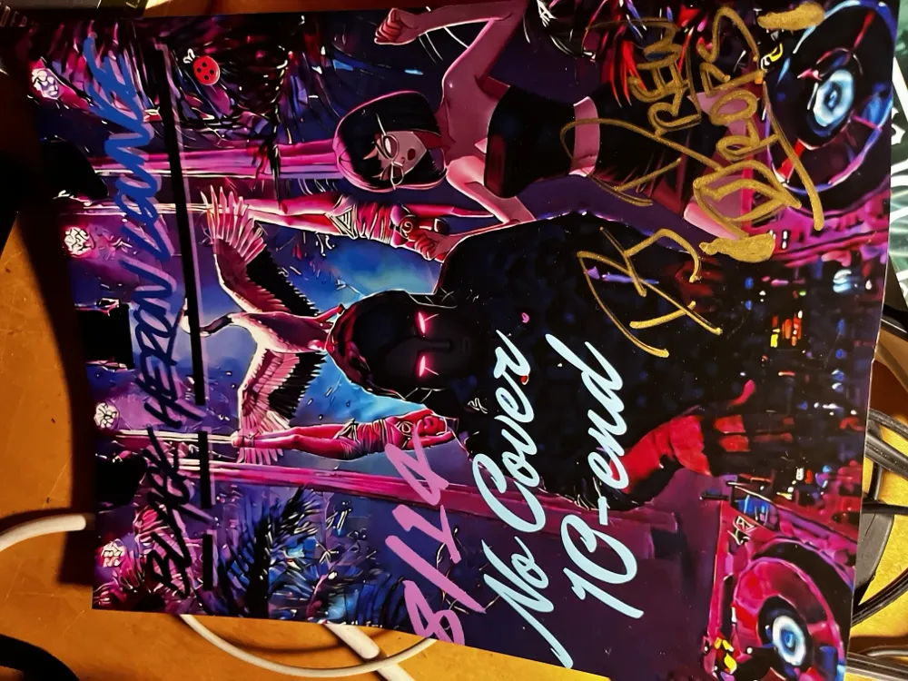A printed Drew Drops flyer signed by hand in gold marker